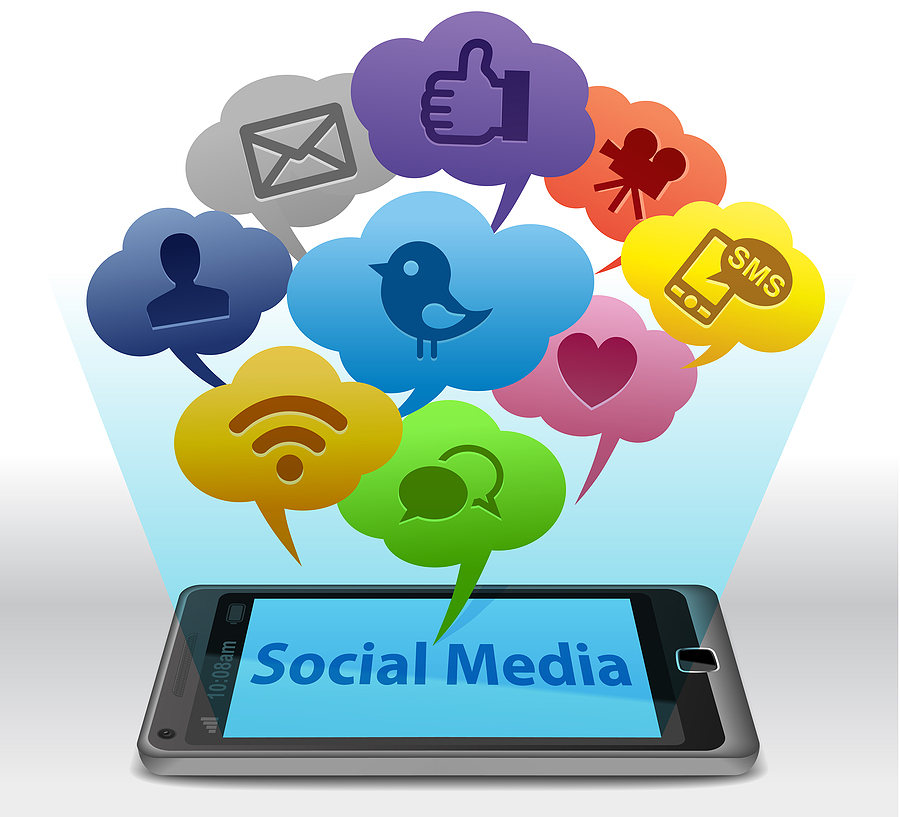 Smartphone and social media concept with speech bubble depicting several social media channels and email.